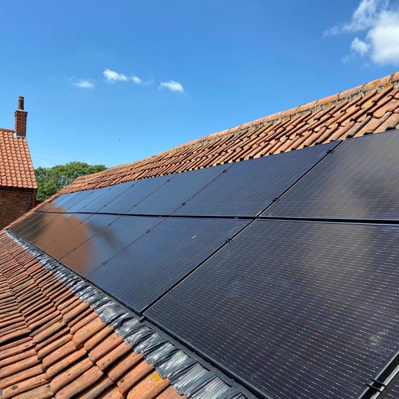 solar panels on a farmhouse roof